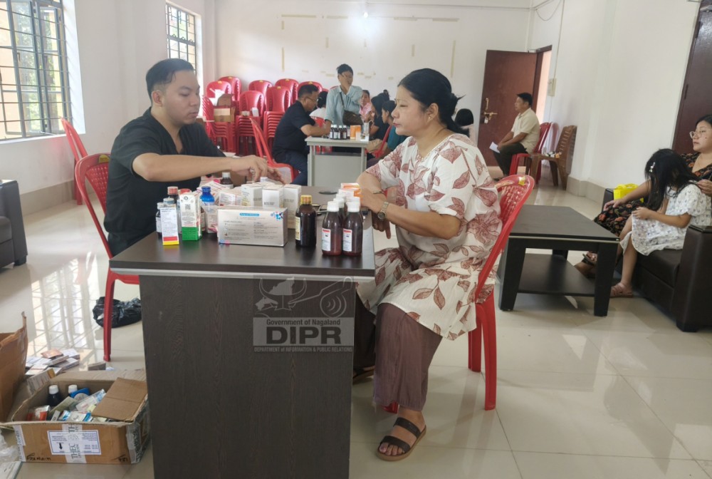 Doctors administer patients during a free medical camp conducted at the Medziphema Town Council Hall on August 26. (DIPR Photo)